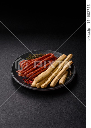 Grissini breadsticks, an Italian wheat pastry, are a great lunch snack. Grissini breadsticks 134682738