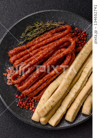 Grissini breadsticks, an Italian wheat pastry, are a great lunch snack. Grissini breadsticks 134682741