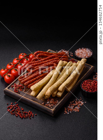 Grissini breadsticks, an Italian wheat pastry, are a great lunch snack. Grissini breadsticks Grissini breadsticks, an Italian wheat pastry, are a great lunch snack. Grissini breadsticks 134682754