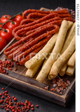 Grissini breadsticks, an Italian wheat pastry, are a great lunch snack. Grissini breadsticks 134682758