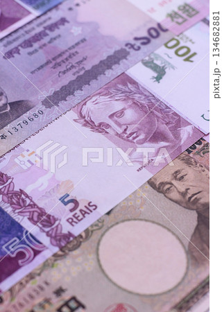 Money background, currency exchange, paper banknotes from different countries. Money cash currency Money background, currency exchange, paper banknotes from different countries. Money cash currency 134682881