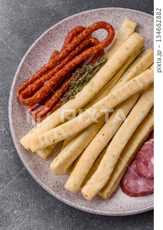 Grissini breadsticks, an Italian wheat pastry, are a great lunch snack. Grissini breadsticks 134682882