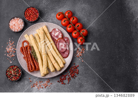 Grissini breadsticks, an Italian wheat pastry, are a great lunch snack. Grissini breadsticks 134682889