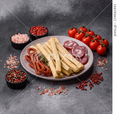 Grissini breadsticks, an Italian wheat pastry, are a great lunch snack. Grissini breadsticks 134682891