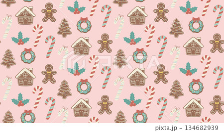 A cute vector seamless Christmas pattern with gingerbread houses, cookies, and candy canes on a pastel pink background. A cute vector seamless Christmas pattern with gingerbread houses, cookies, and candy canes on a pastel pink background. 134682939