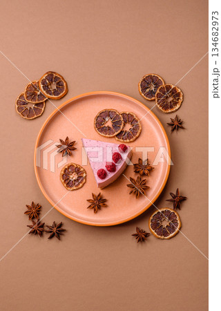Raspberry or strawberry cheesecake, a slice of sweet red cake with berries. Raspberry cheesecake 134682973