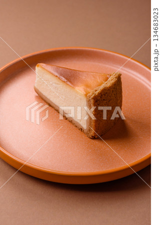 New York cheesecake, a slice of sweet pie, a classic cheesecake dessert. New York cheesecake 134683023