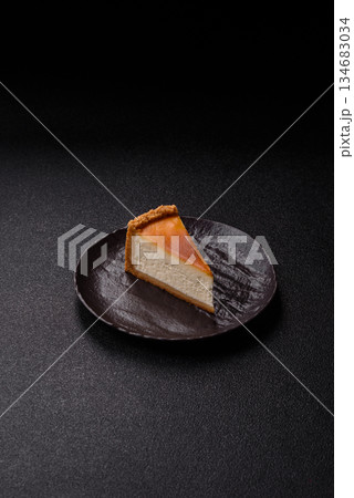 New York cheesecake, a slice of sweet pie, a classic cheesecake dessert. New York cheesecake 134683034