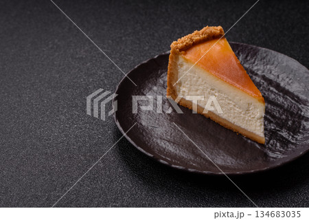 New York cheesecake, a slice of sweet pie, a classic cheesecake dessert. New York cheesecake New York cheesecake, a slice of sweet pie, a classic cheesecake dessert. New York cheesecake 134683035