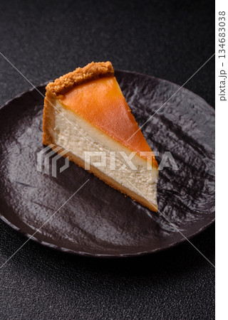 New York cheesecake, a slice of sweet pie, a classic cheesecake dessert. New York cheesecake 134683038