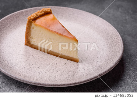 New York cheesecake, a slice of sweet pie, a classic cheesecake dessert. New York cheesecake 134683052