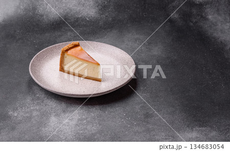 New York cheesecake, a slice of sweet pie, a classic cheesecake dessert. New York cheesecake 134683054