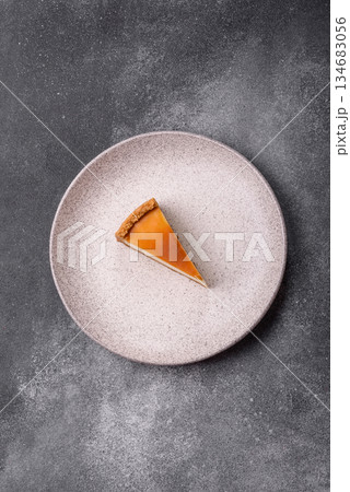 New York cheesecake, a slice of sweet pie, a classic cheesecake dessert. New York cheesecake 134683056