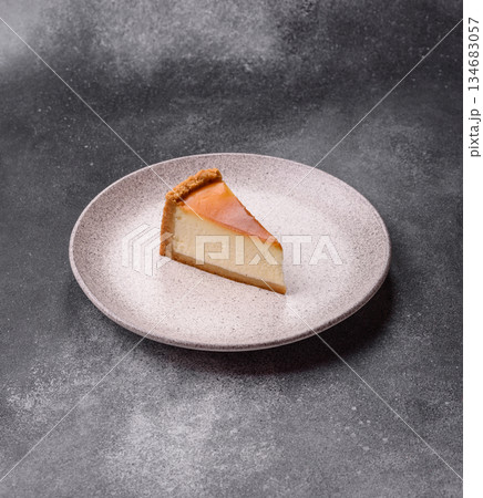 New York cheesecake, a slice of sweet pie, a classic cheesecake dessert. New York cheesecake 134683057