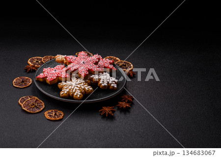 Gingerbread, Christmas cookies, and ornamental holiday baked goods. Christmas gingerbread Gingerbread, Christmas cookies, and ornamental holiday baked goods. Christmas gingerbread 134683067