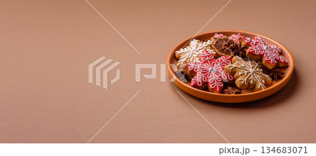 Gingerbread, Christmas cookies, and ornamental holiday baked goods. Christmas gingerbread Gingerbread, Christmas cookies, and ornamental holiday baked goods. Christmas gingerbread 134683071