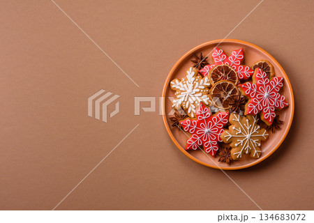 Gingerbread, Christmas cookies, and ornamental holiday baked goods. Christmas gingerbread Gingerbread, Christmas cookies, and ornamental holiday baked goods. Christmas gingerbread 134683072