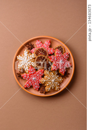 Gingerbread, Christmas cookies, and ornamental holiday baked goods. Christmas gingerbread Gingerbread, Christmas cookies, and ornamental holiday baked goods. Christmas gingerbread 134683073