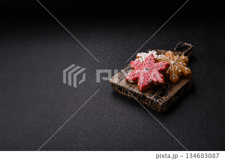 Gingerbread, Christmas cookies, and ornamental holiday baked goods. Christmas gingerbread Gingerbread, Christmas cookies, and ornamental holiday baked goods. Christmas gingerbread 134683087