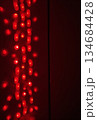 AI generated Modern artistic display featuring red LED cascades and gentle bokeh effects 134684428