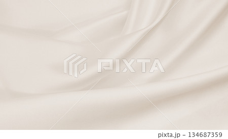 Smooth elegant golden silk or satin luxury cloth texture as wedding background. Luxurious background design. In Sepia toned. Retro style Smooth elegant golden silk or satin luxury cloth texture as wedding background. Luxurious background design. In Sepia toned. Retro style 134687359