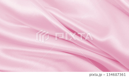 Smooth elegant pink silk or satin texture as wedding background. Luxurious background design 134687361