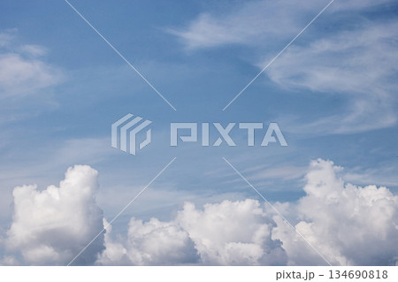 Expansive Blue Sky with Fluffy White Clouds. Cloudy Sky. Cloudscape Atmosphere. Nature and Climate Concept. Daylight Clouds Sky. High quality photo 134690818