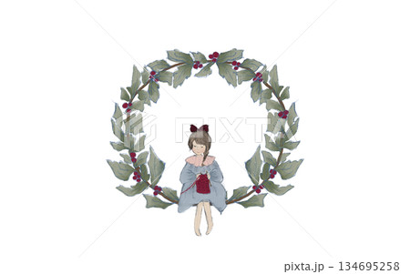 リースに座って編み物をする少女 134695258