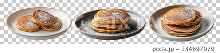 Stack of fluffy golden pancakes sprinkled with powdered sugar on a ceramic plate, isolated on white background Stack of fluffy golden pancakes sprinkled with powdered sugar on a ceramic plate, isolated on white background 134697079