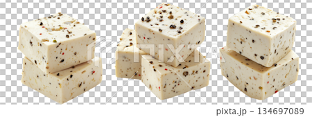 Cubes of seasoned tofu with visible herbs and spices, arranged in stack isolated on white transparent background Cubes of seasoned tofu with visible herbs and spices, arranged in stack isolated on white transparent background 134697089