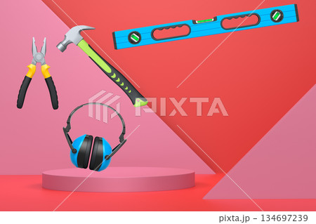 Construction tools and safety equipment floating over podium on abstract background, industrial work and protection concept 134697239