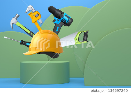 Construction tools and safety equipment floating over podium on abstract background, industrial work and protection concept 134697240