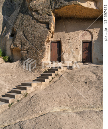 Entrance to Snake Church Yilanli Kilise, a historic rock-cut church in Goreme Open-Air Museum, Cappadocia, Turkey. Entrance to Snake Church Yilanli Kilise, a historic rock-cut church in Goreme Open-Air Museum, Cappadocia, Turkey. 134697421
