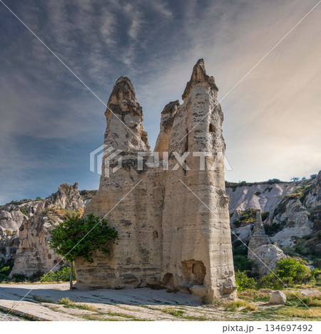 Towering Fairy Chimneys and ancient cave dwellings at Goreme Open Air Museum, Goreme, Turkey. 134697492