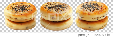 Stack of golden brown fluffy Korean Hotteok pancakes lightly dusted with powdered sugar, isolated on white background 134697516