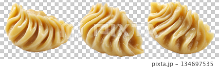 Set of Steamed Banana dumplings with intricate twisted edges, isolated on white background. Concept of Asian cuisine and food art Set of Steamed Banana dumplings with intricate twisted edges, isolated on white background. Concept of Asian cuisine and food art 134697535