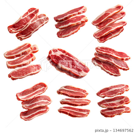 Set of of fresh pork slices displayed isolated on white background, showcasing texture and quality Set of of fresh pork slices displayed isolated on white background, showcasing texture and quality 134697562