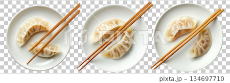 Pan-fried or steamed dumplings Jiaoz arranged on a wooden plate, isolated on white background, concept of Asian cuisine 134697710