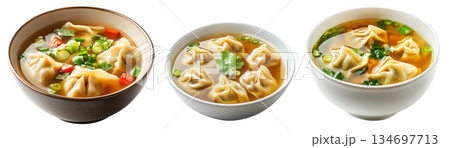 Steamed Dumplings served in hot Wonton Soup garnished with cilantro and scallions, isolated on white background 134697713