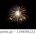 Festive colorful fireworks on black background for celebration and anniversary 134698122