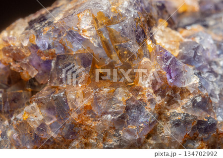 Mineral formation with fluorite crystals found in rock in middle of natural environment 134702992