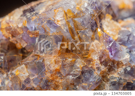 Mineral formation with fluorite crystals found in rock in middle of natural environment 134703005