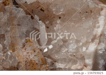 Surface of clear minerals with crystals and reflections inside Surface of clear minerals with crystals and reflections inside 134703025