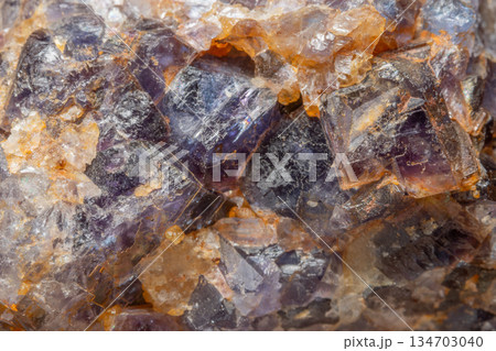 Mineral formation with fluorite crystals found in rock in middle of natural environment 134703040