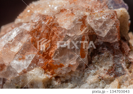 Mineral formation with fluorite crystals found in rock in middle of natural environment Mineral formation with fluorite crystals found in rock in middle of natural environment 134703043