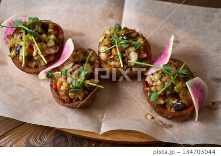 Indulgent Gourmet Appetizers Crafted with a Variety of Fresh Vegetables and Aromatic Herbs 134703044