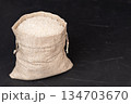 A bag of rice on a black background 134703670