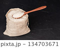 A bag of rice on a black background 134703671