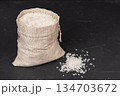 A bag of rice on a black background 134703672