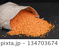 A bag of lentils on a black background 134703674